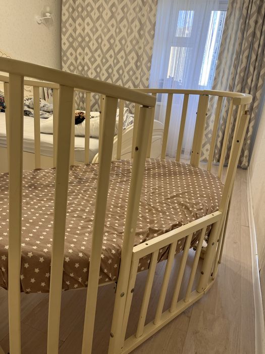 Детская кроватка трансформер с маятником