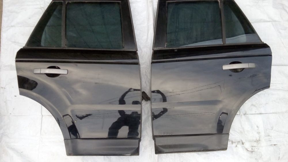 Двери Land Rover Range Rover Sport.