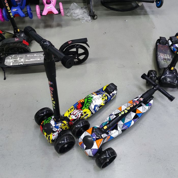 Самакат складной ручкой с музыкой