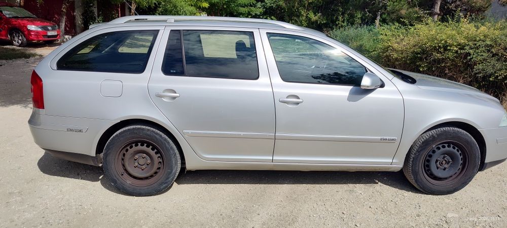 Skoda Octavia 2 ELEGANCE 2006, dublu climatronic,navigație,1,6 FSI, benzina,euro4,115cp 238133km =2900 euro neg.