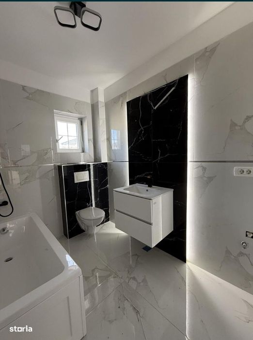 Casă individuală de vânzare – 4 camere, 120 mp, teren 250 mp