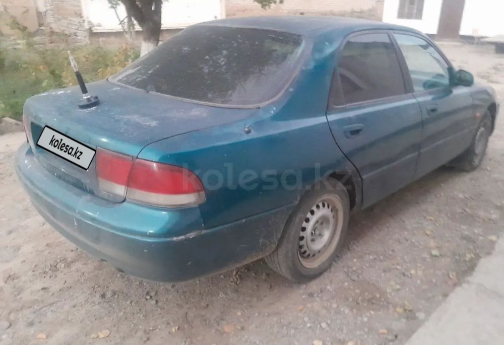 Мазда Кронос по запчастям.