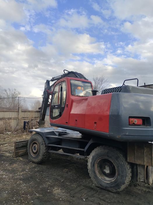 Продам колесный экскаватор