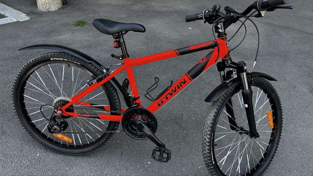 Bicicleta B’Twin Rockrider 500, 24”, 18 viteze, suspensie, stare foarte buna