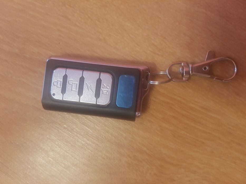 Telecomandă automatizare uși garaj