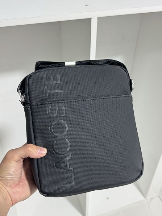 Барсетки Lacoste в черным и синем цвете