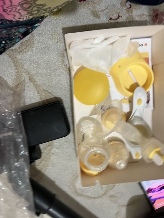 Молокоотсос Medela ,бандаж Фэст
