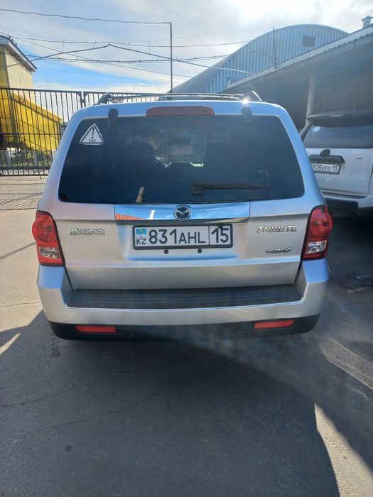 Продам Mazda tribute