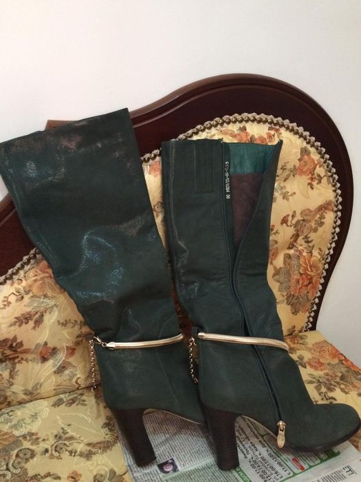 Новые женские сапоги