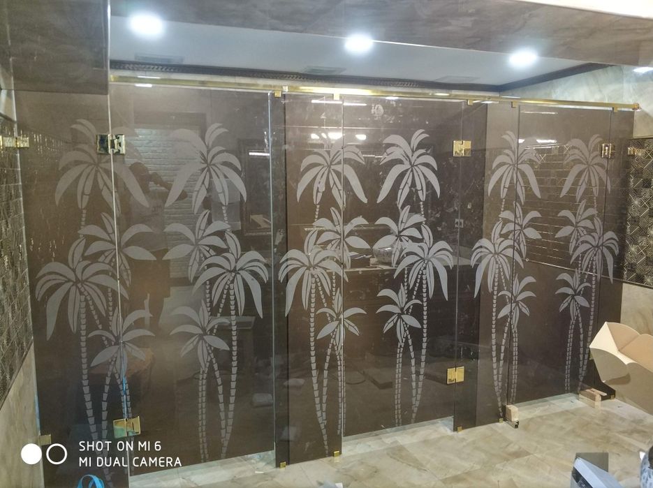 Изготовление и установка стеклянной дверей и витражей из 1 см стйокл