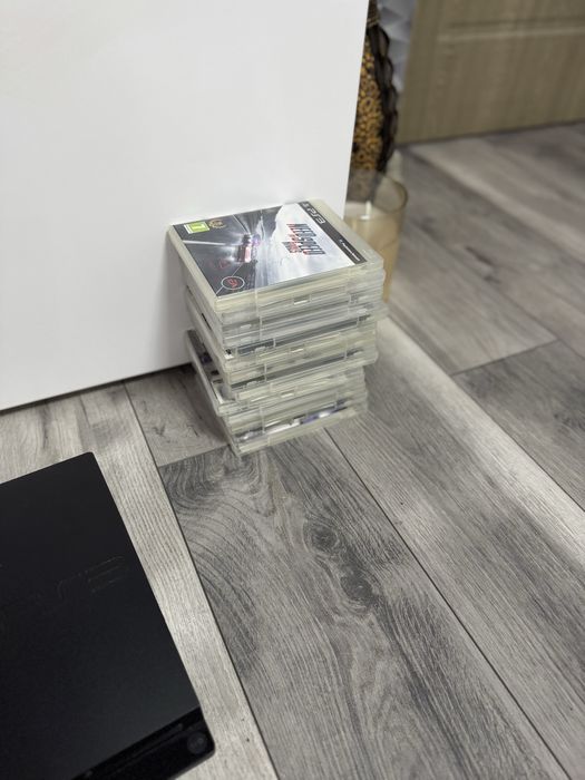 Vand Play Station 3 + 15  jocuri