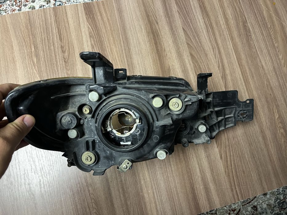 Фара Mitsubishi Outlander 1 левая сторона