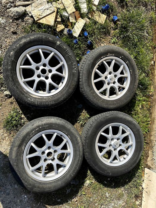 Jante Nissan 16" 5x114.3 cu anvelope de iarna Continental