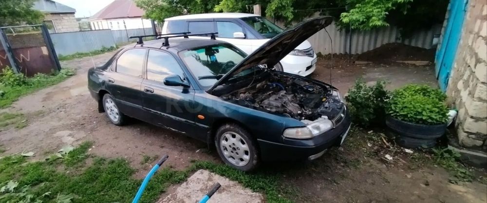 Мазда Кронос 1.8