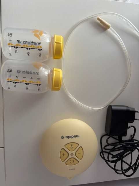 Продавам SWING FLEX двуфазна електрическа помпа Medela + допълнения
