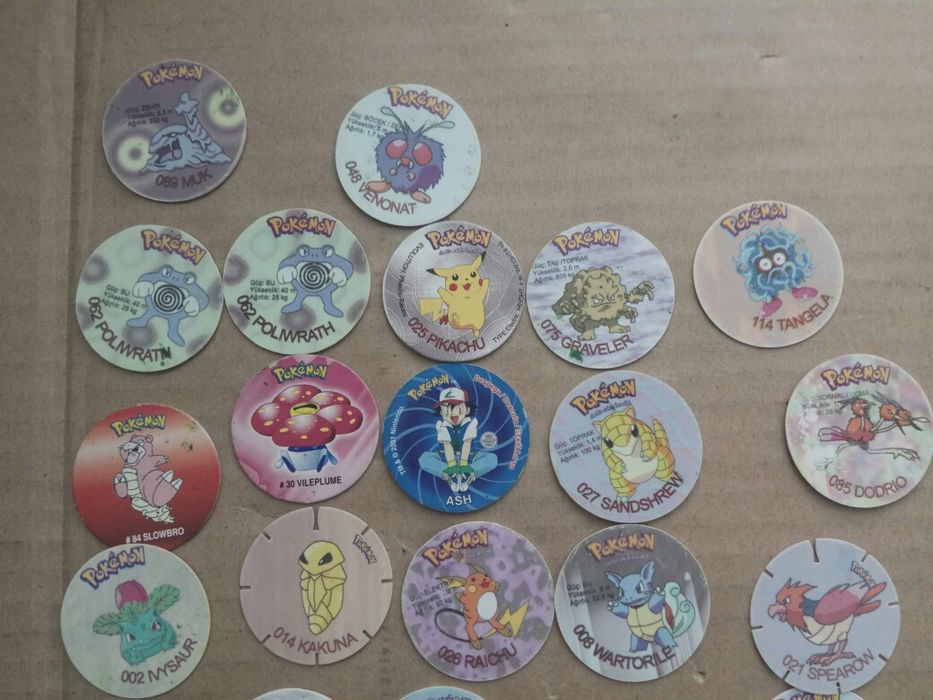 Продавам Покемон карти за игра , фигурка , тазота,Lapras Aqua