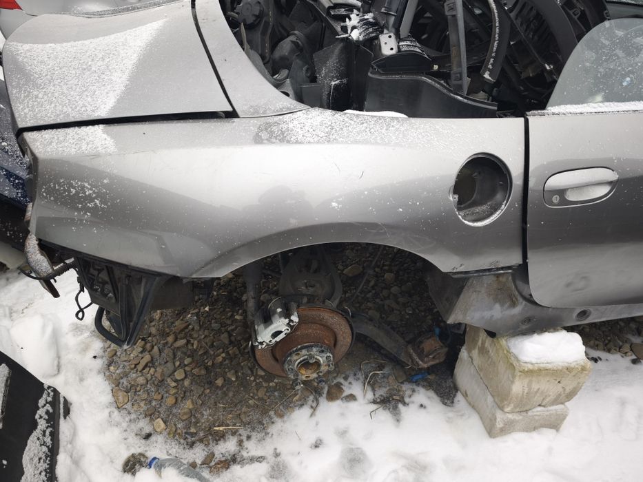 Elemente caroserie aripa dreapta spate stanga spate BMW Z4 2004