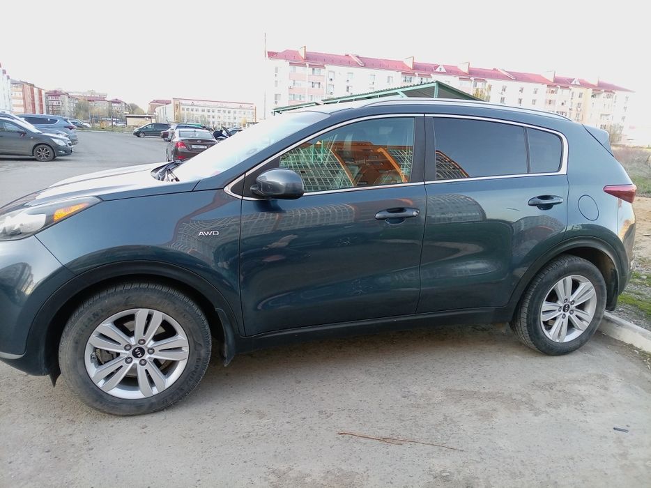 > автомобиль Киа Спортейдж 2016 г