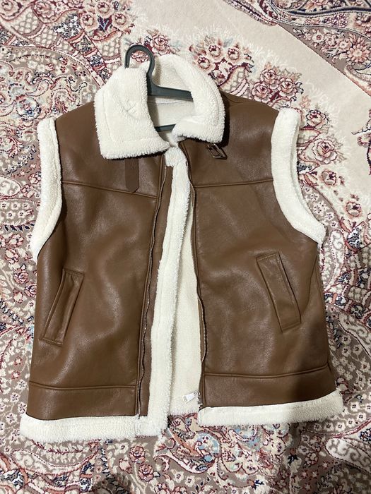 Сырт киімдер киілген