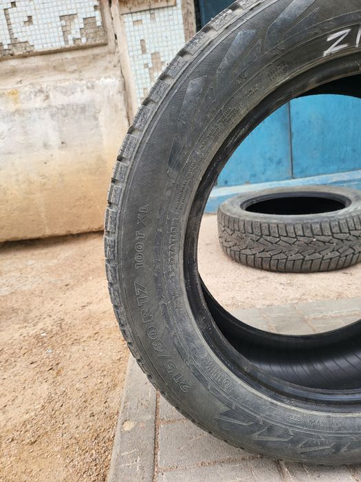 Продам зимние шипованные шины б/у
