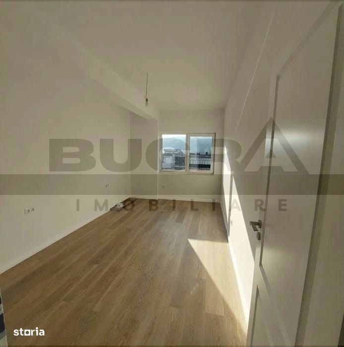 Apartament finisat cu 3 camere, 75 mp,  parare, zona Baciu Regal