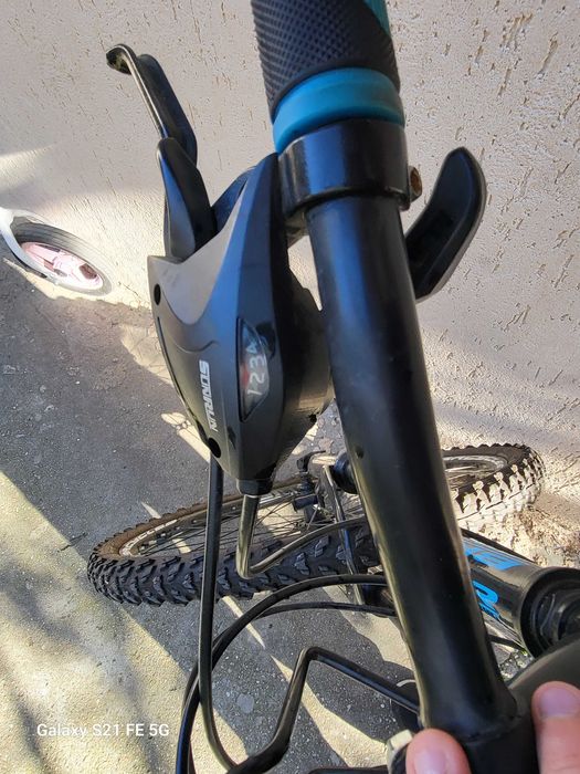 Bicicletă copii 9-12 ani