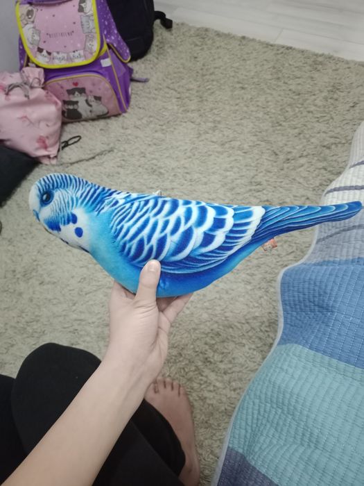 Продам игрушку-попугай