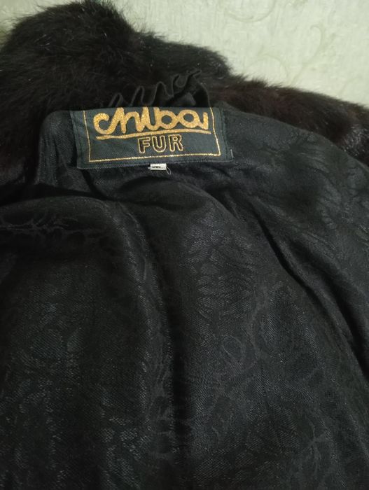 Одежда женская верхняя.