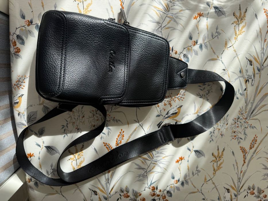 стильная мужская сумка-барсетка.