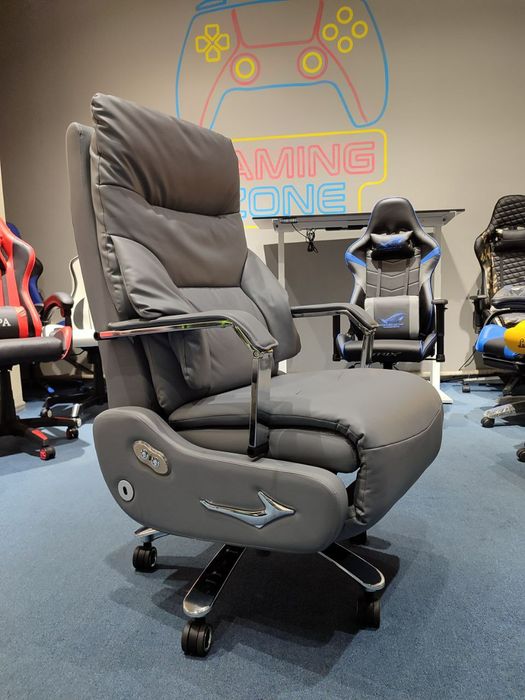 Кресло для руководителя электро регулировкой и вибромассажем.