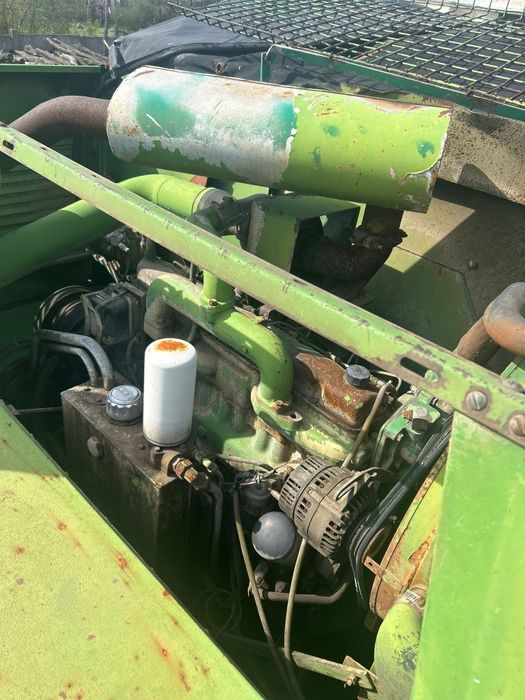 Combina John  Deer 975 cu motor defect sau odezmembrez.