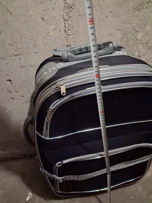 Пътнически куфар с колелца