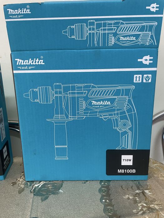 Masina de gaurit cu percutie Makita 710 w