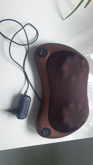 Масажьор с въртящи се глави и затопляне