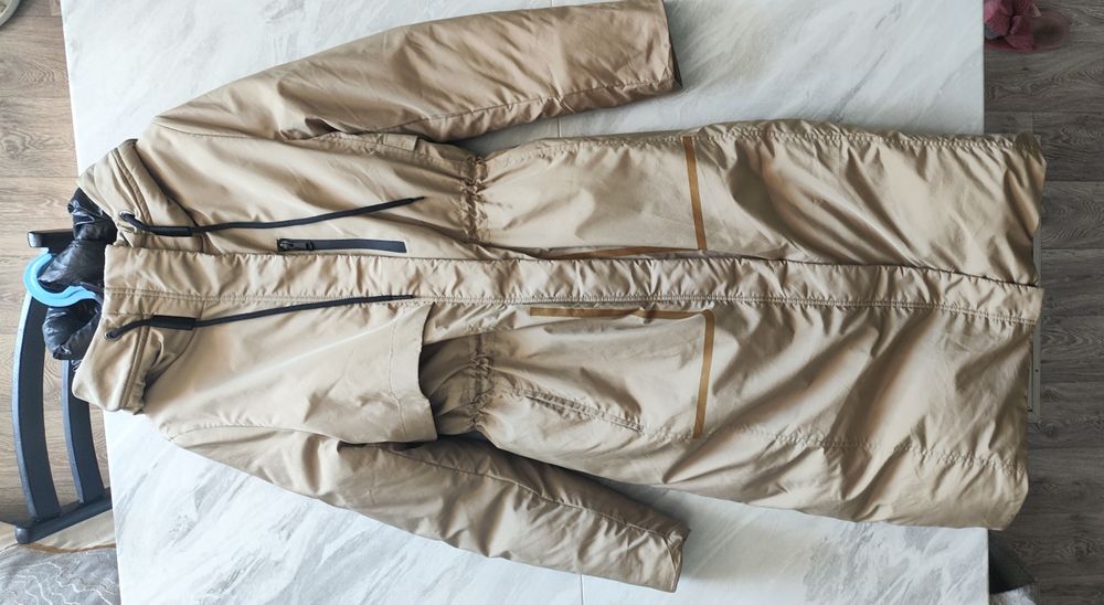 Продам б/у пуховики