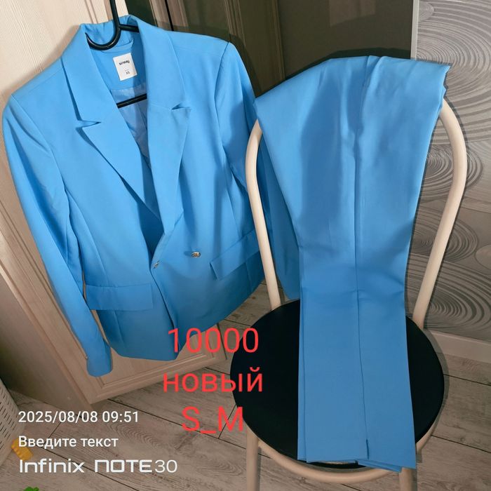 Продам новый женский костюм