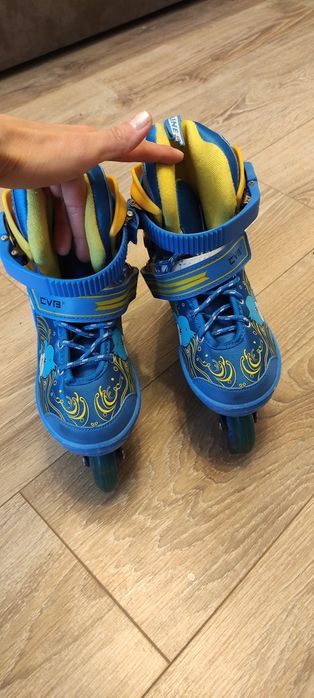 Роликовые коньки