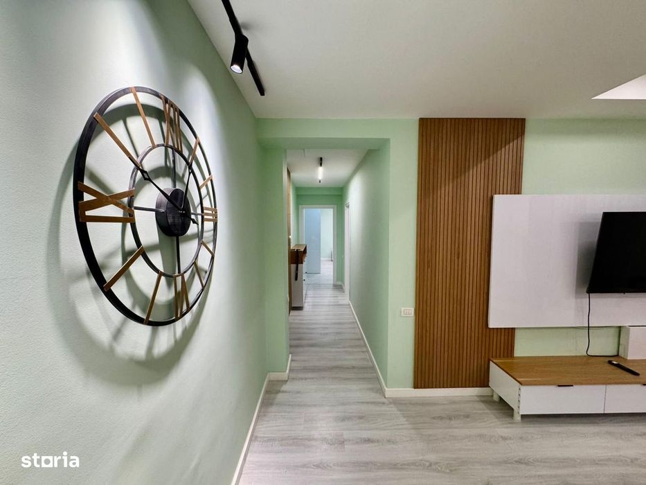 COSMOPOLIS - Apartament cu 3 camere si gradina, mobilat si utilat.