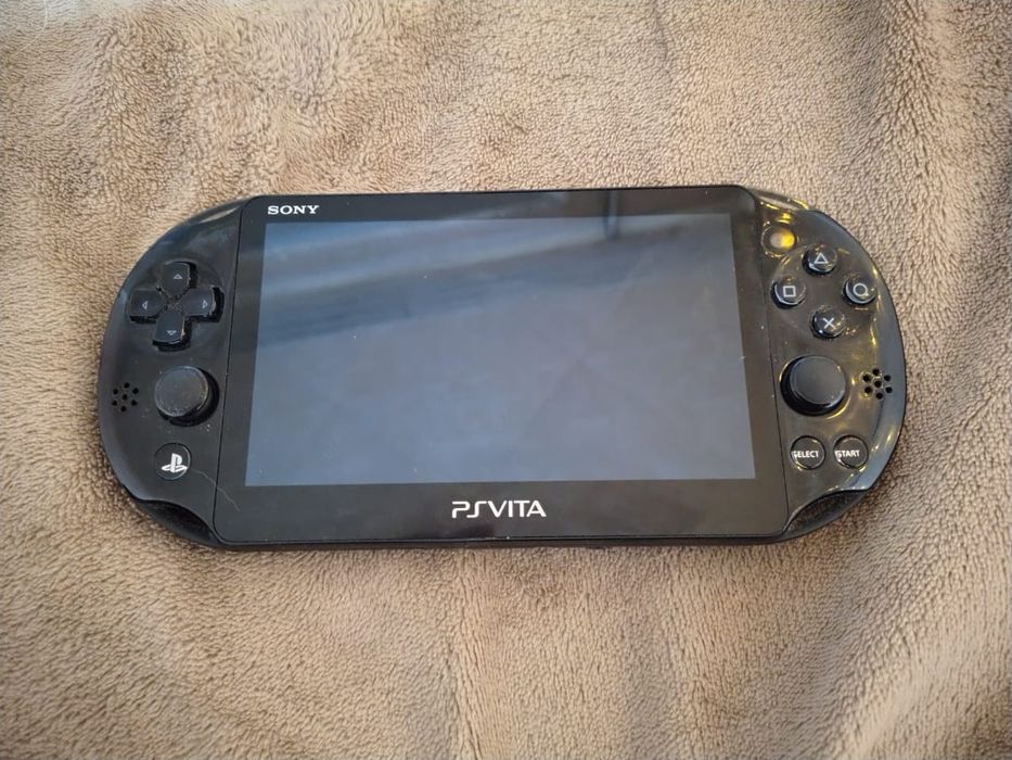 Продам Ps Vita с дисками