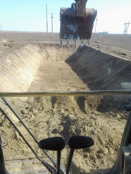 Inchirieri utilaje constructii Închiriez Excavator pe Pneuri – Prestări Servicii în Construcții și Terasamente