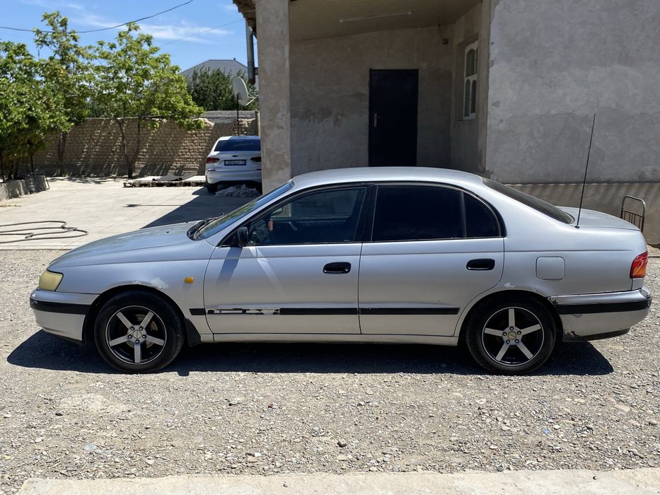 Tayota Carina E  Газ бензин