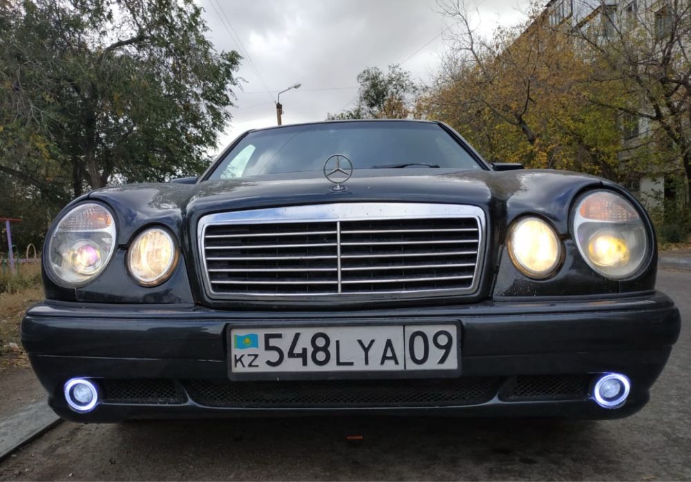 Бампер для мерседес 210 лупарик е55 амг стиль