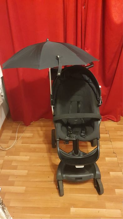 Carucior Stokke stare excelenta umbrela si geanta negru