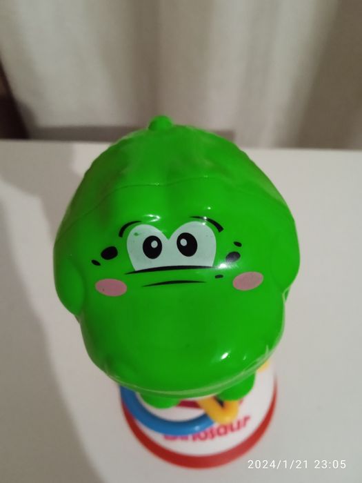 Динозаврик - игрушка