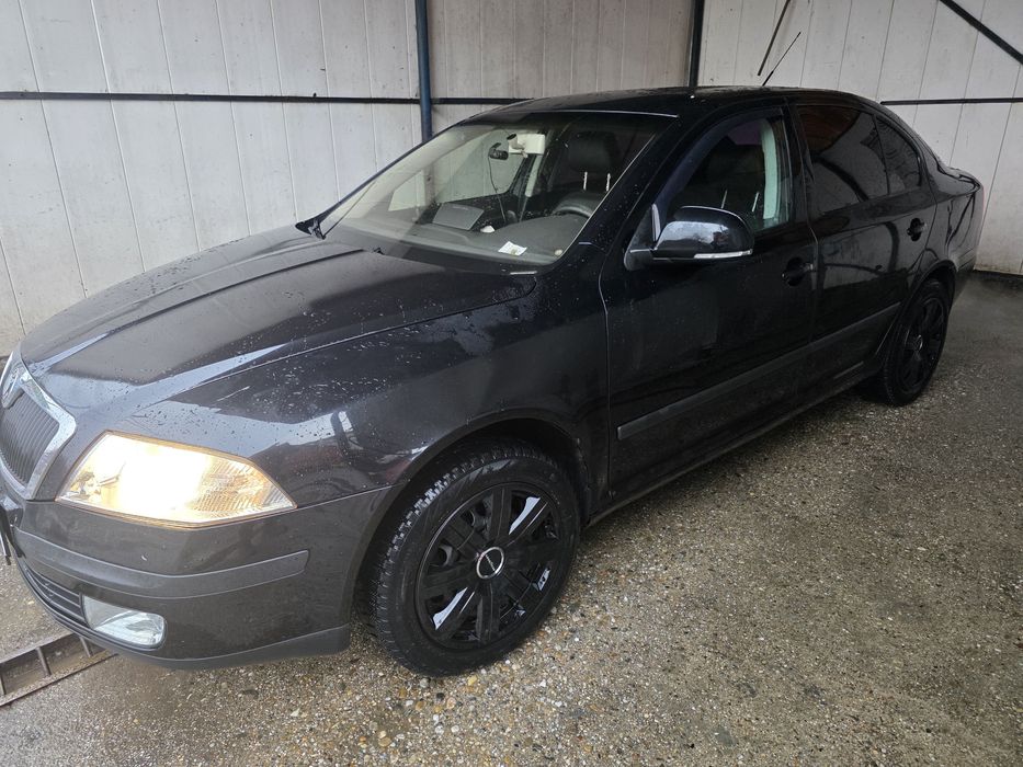 Vând skoda octavia 2 1.6
