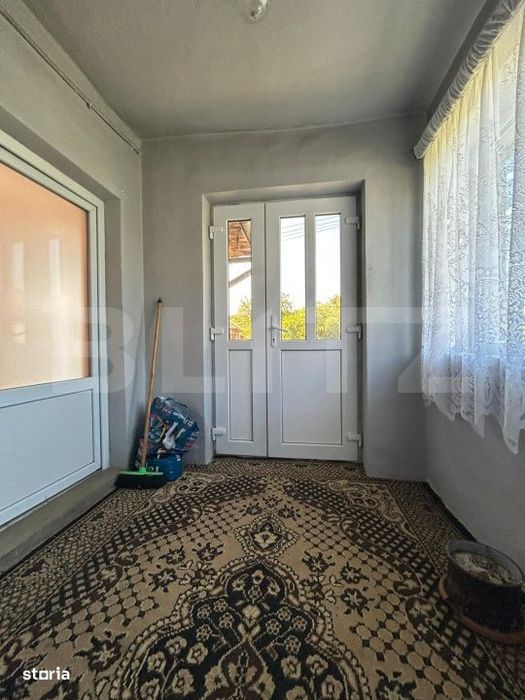 Casa cu teren generos de 1100 mp in Comuna Mica – ideala pentru inve