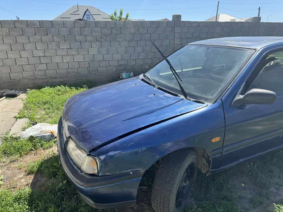 Машина ниссан примера