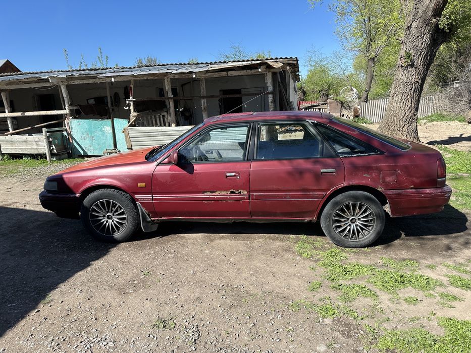 Мазда 626 идияльным состояний