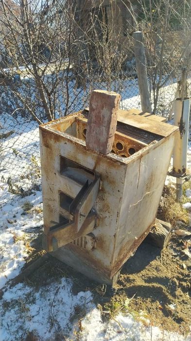 Печка котел на твердом топливе