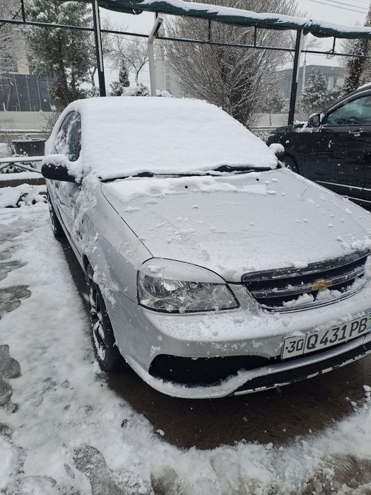 Ласетти 1.8 автомат петно